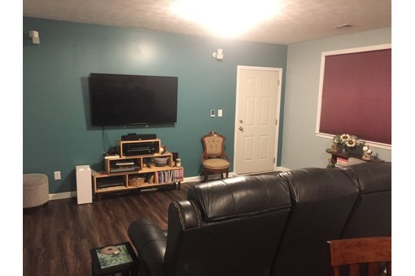 Finished media room with heated LVT floors