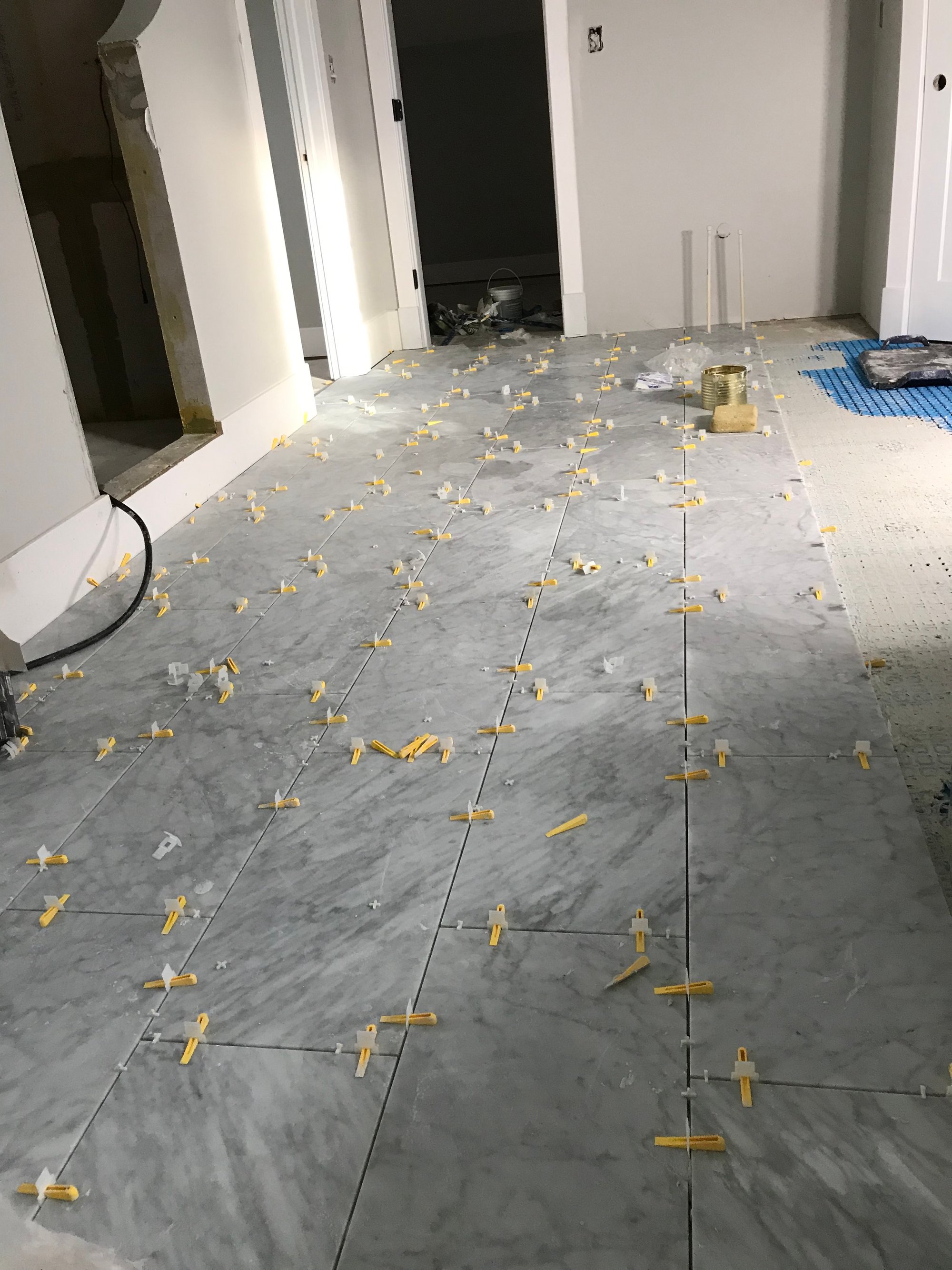 Floor heating installation with Prodeso, TempZone Cable, thinset, tile spacers, and large format tiles PERRY HALL, MD