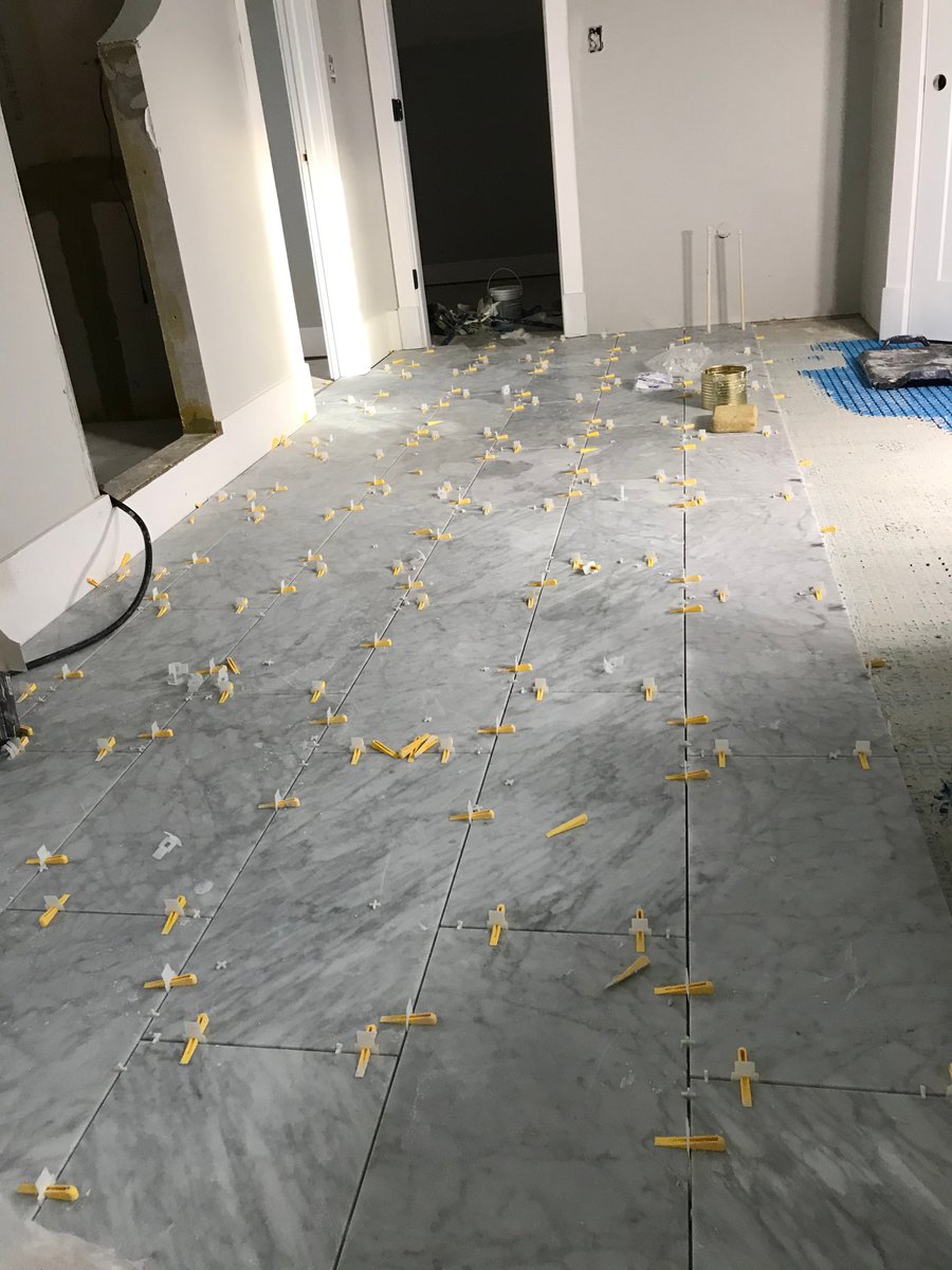 Floor heating installation with Prodeso, TempZone Cable, thinset, tile spacers, and large format tiles PERRY HALL, MD