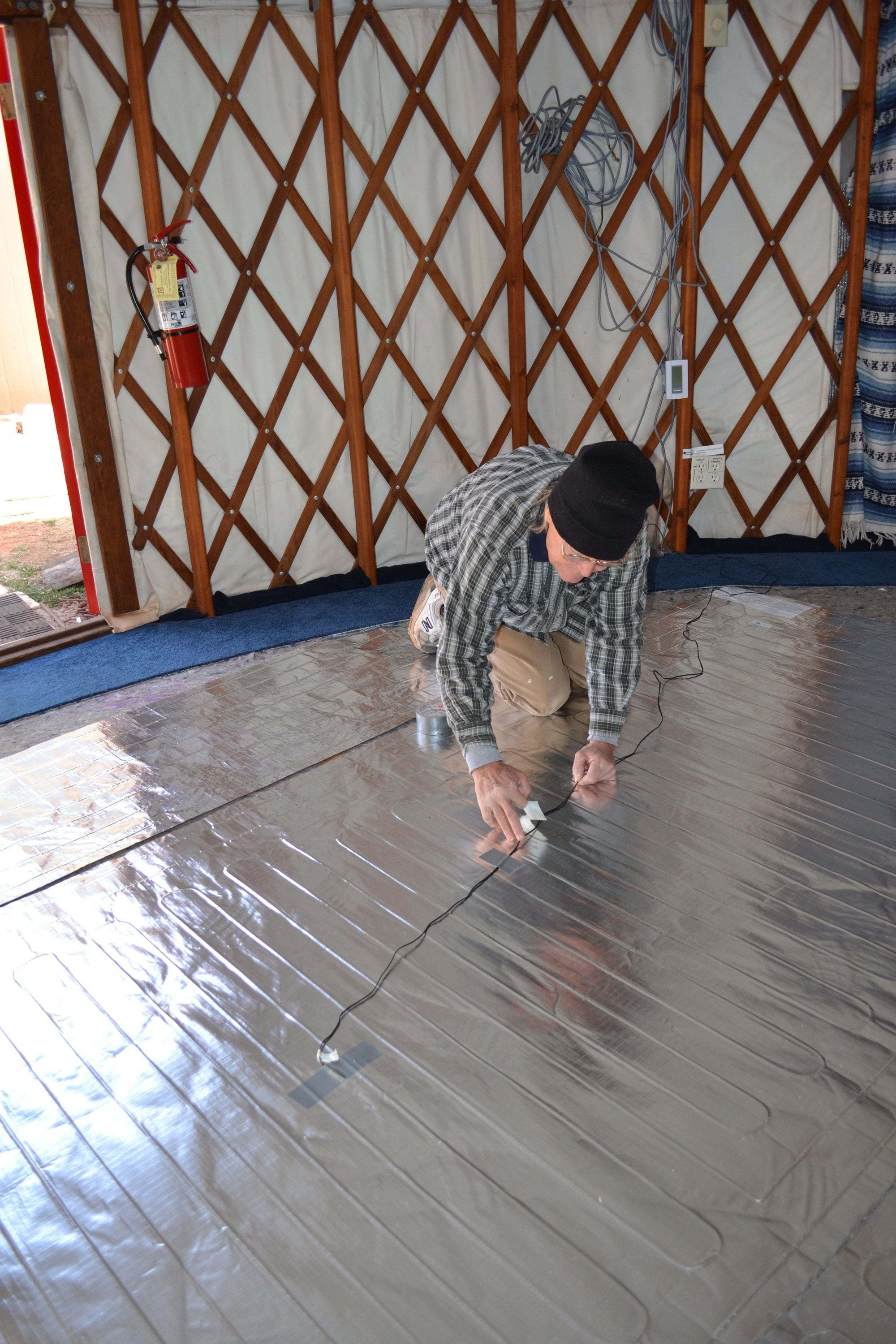 Floor sensor installation for Environ system in Yoga Yurt