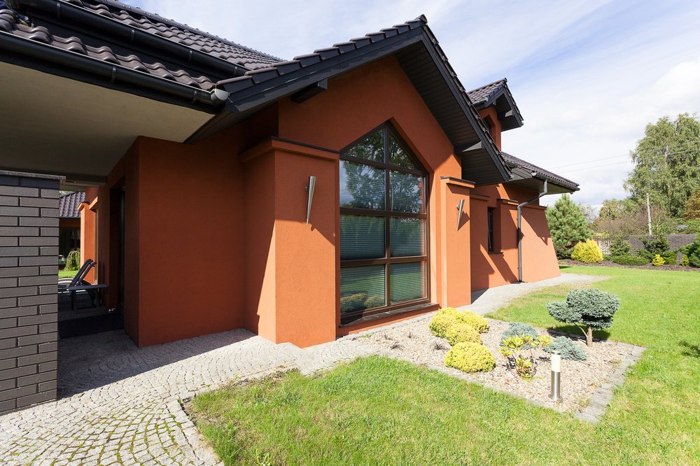 Passive solar design includes windows with southern exposure and overhangs to optimize the use of the sun's energy in summer and winter.