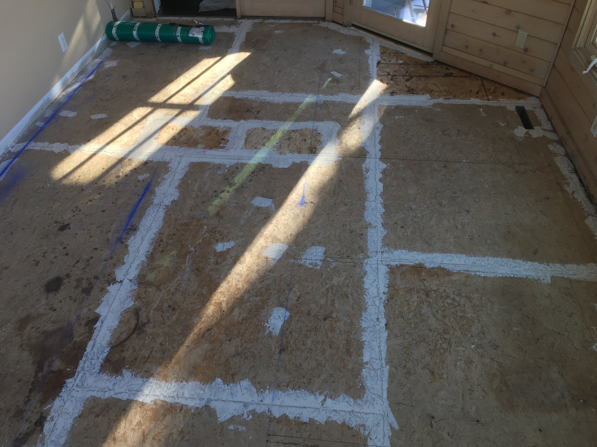 Four Seasons Room with Floor Heating wood subfloor