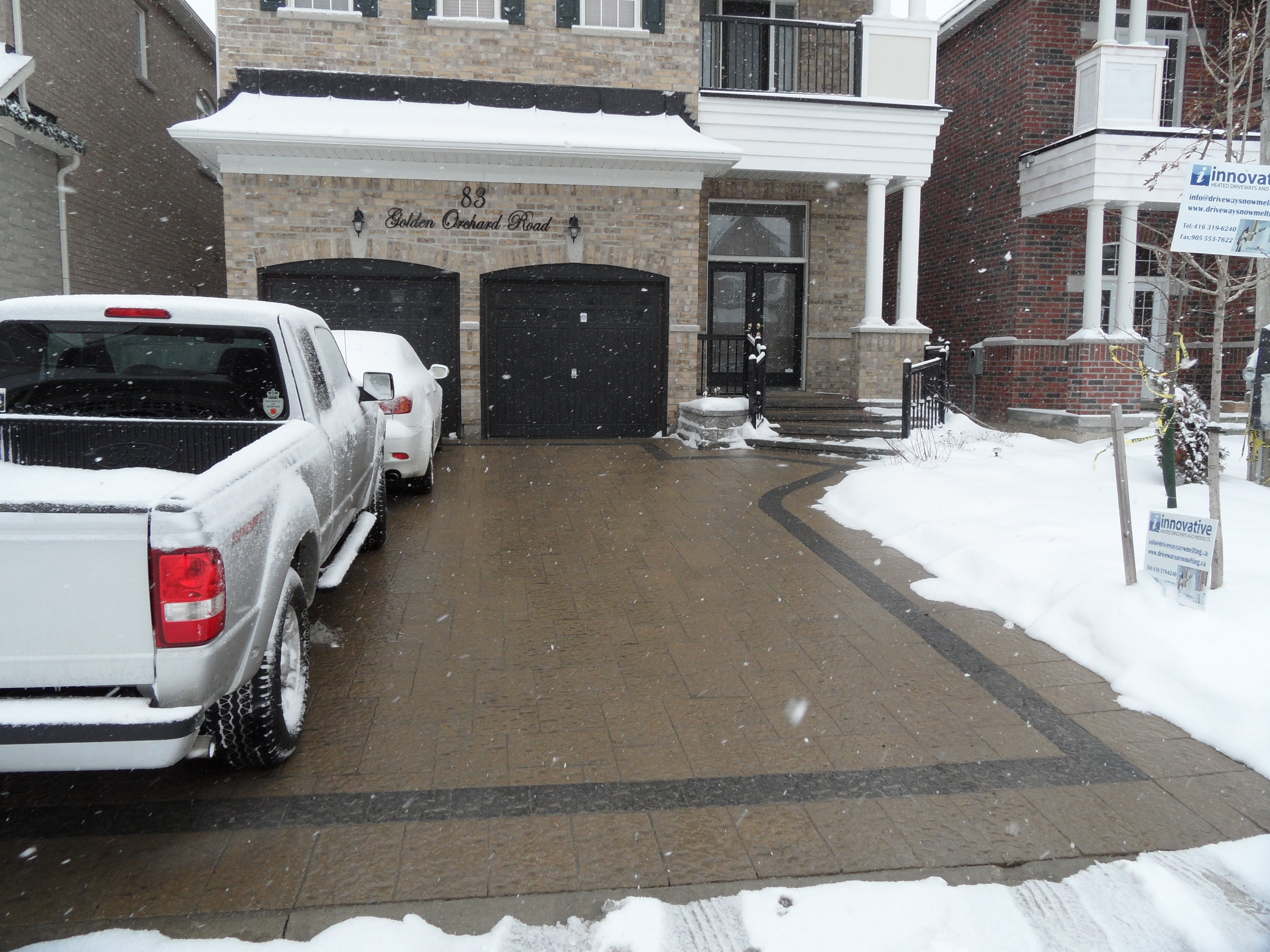 Front view of snow-melt system in a paver driveway