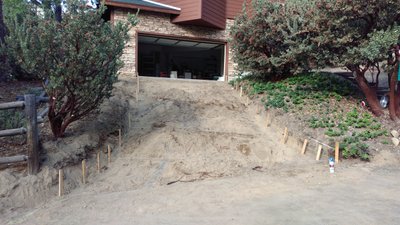 Graded dirt for driveway installation of snow melting system