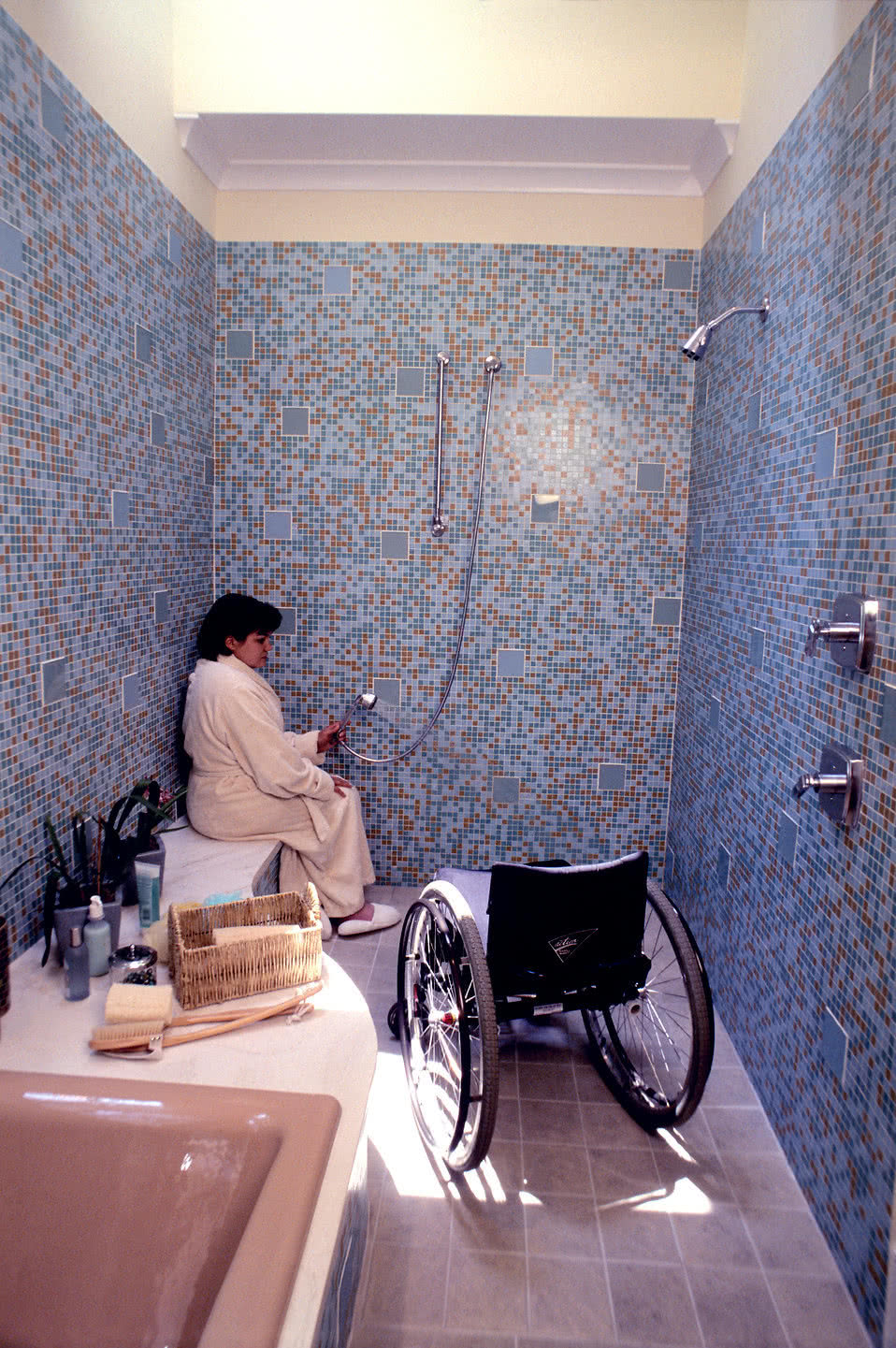senior woman sitting on specifically designed wet area shower bench