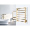 Hardwired electric towel warmer with gold finish wall-mounted in a bathroom.