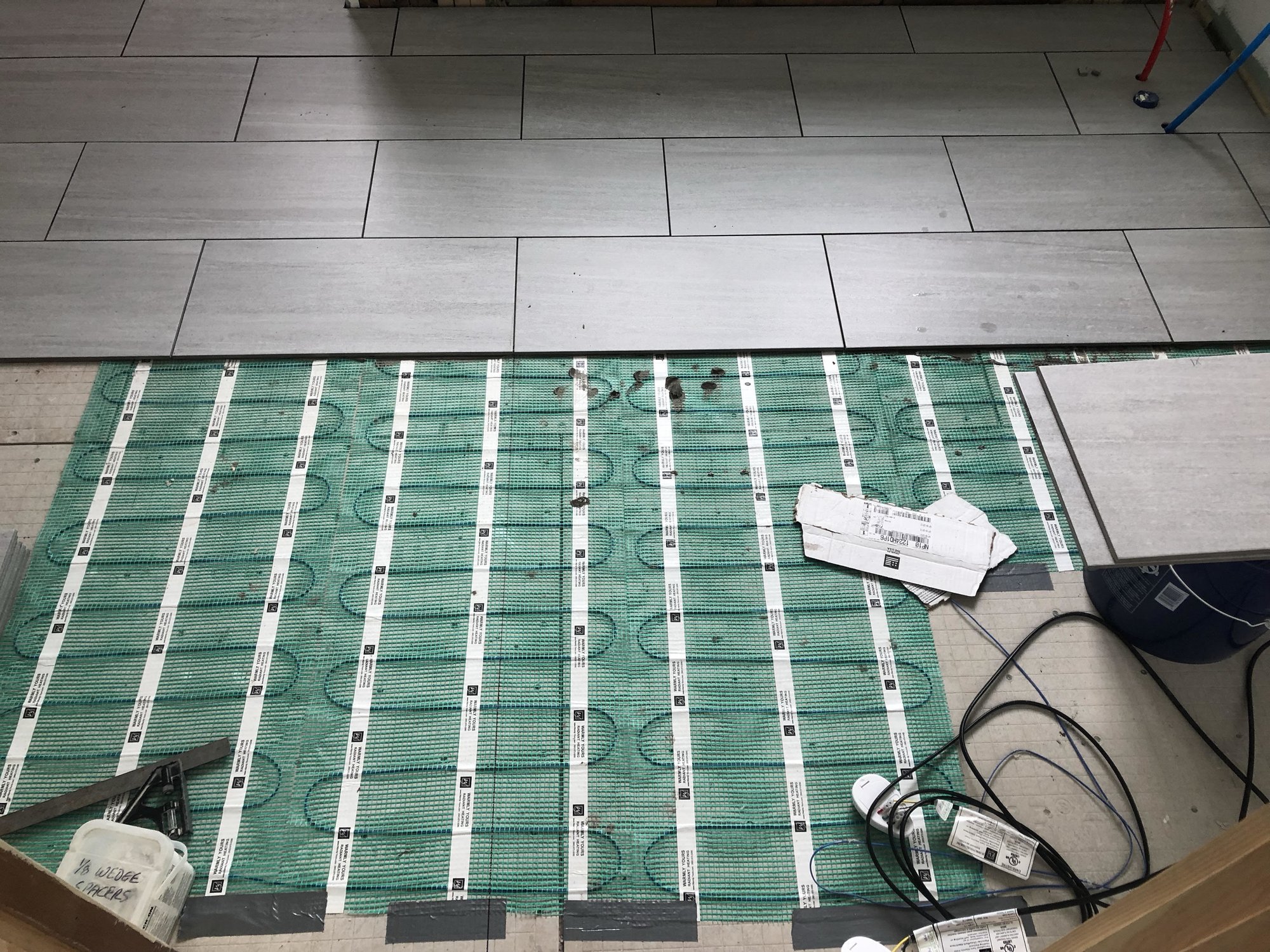 Heated Bathroom Floor Installation with tile in a bathroom CAMDEN, ME