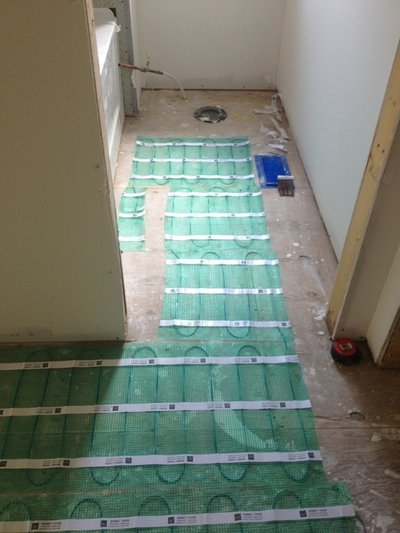 heated bathroom floor installation for toilet area