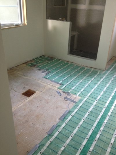 heated bathroom floor installation near shower enclosure NORTH YORK, ON