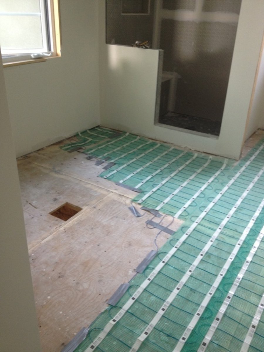 heated bathroom floor installation near shower enclosure NORTH YORK, ON