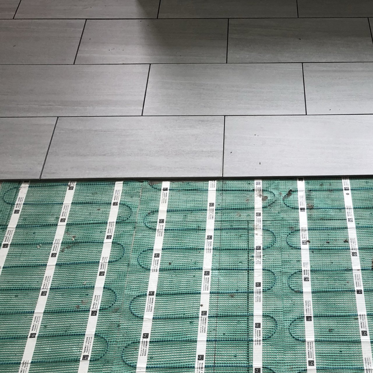 Luxury Floor Warming for a Coastal Maine Master Bathroom