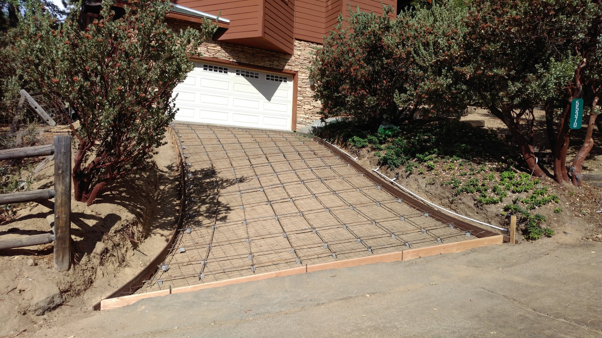Heated Driveway installation with metal rebar frame