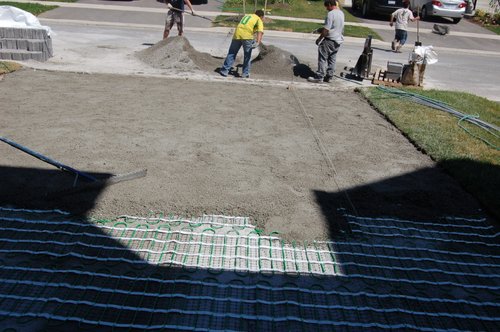 Heated Paver Driveway Installation spreading sand layer VAUGHAN, ON