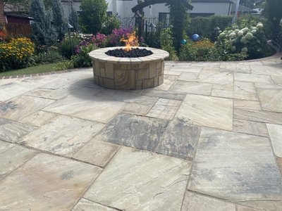 Enjoy Your Fire Pit All Year: A Luxurious Heated Paver Patio in Colorado Springs
