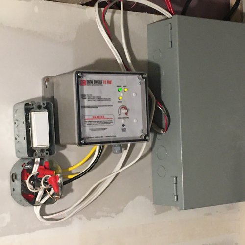 Heated paver walkway controls in garage