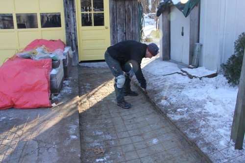 Attachment grid installation for securing snow melting cables on heated wheelchair ramp in Hudson, MA