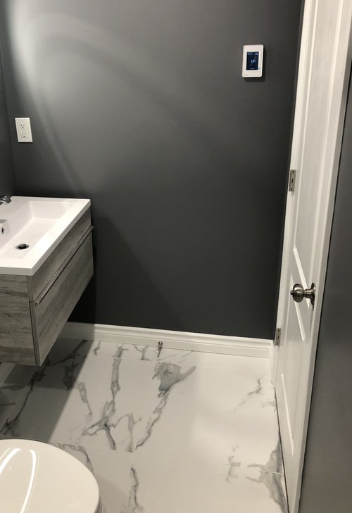 Heated Tile Installation for remodeled basement bathroom doorway WHITCHURCH-STOUFFVILLE, ON