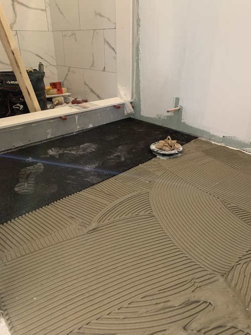 Heated Tile Installation for remodeled basement bathroom thinset