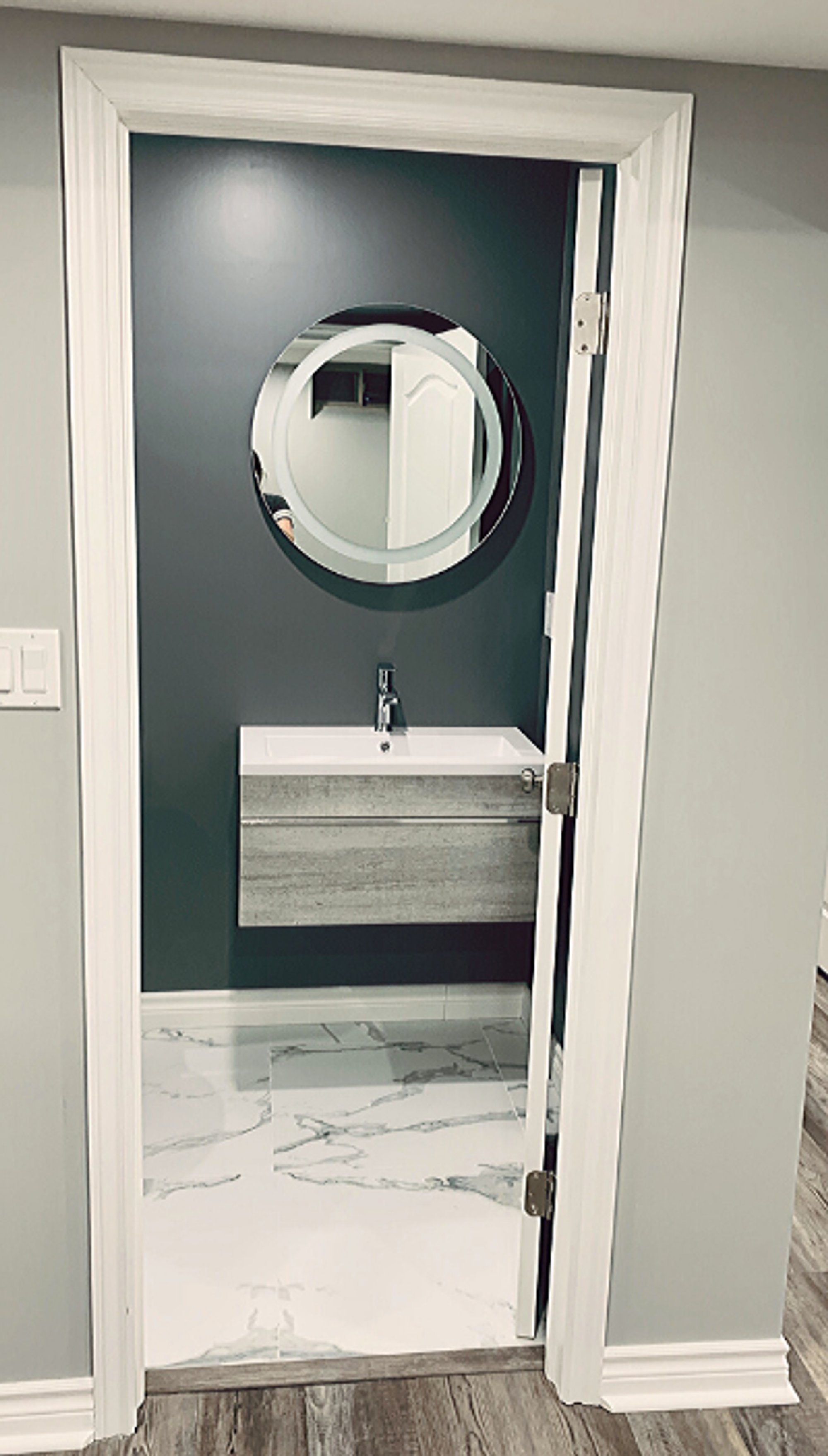 Heated Tile Installation for remodeled basement bathroom after shot