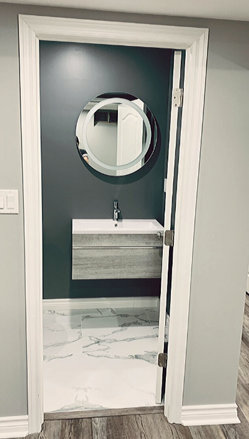 Heated Tile Installation for remodeled basement bathroom after shot