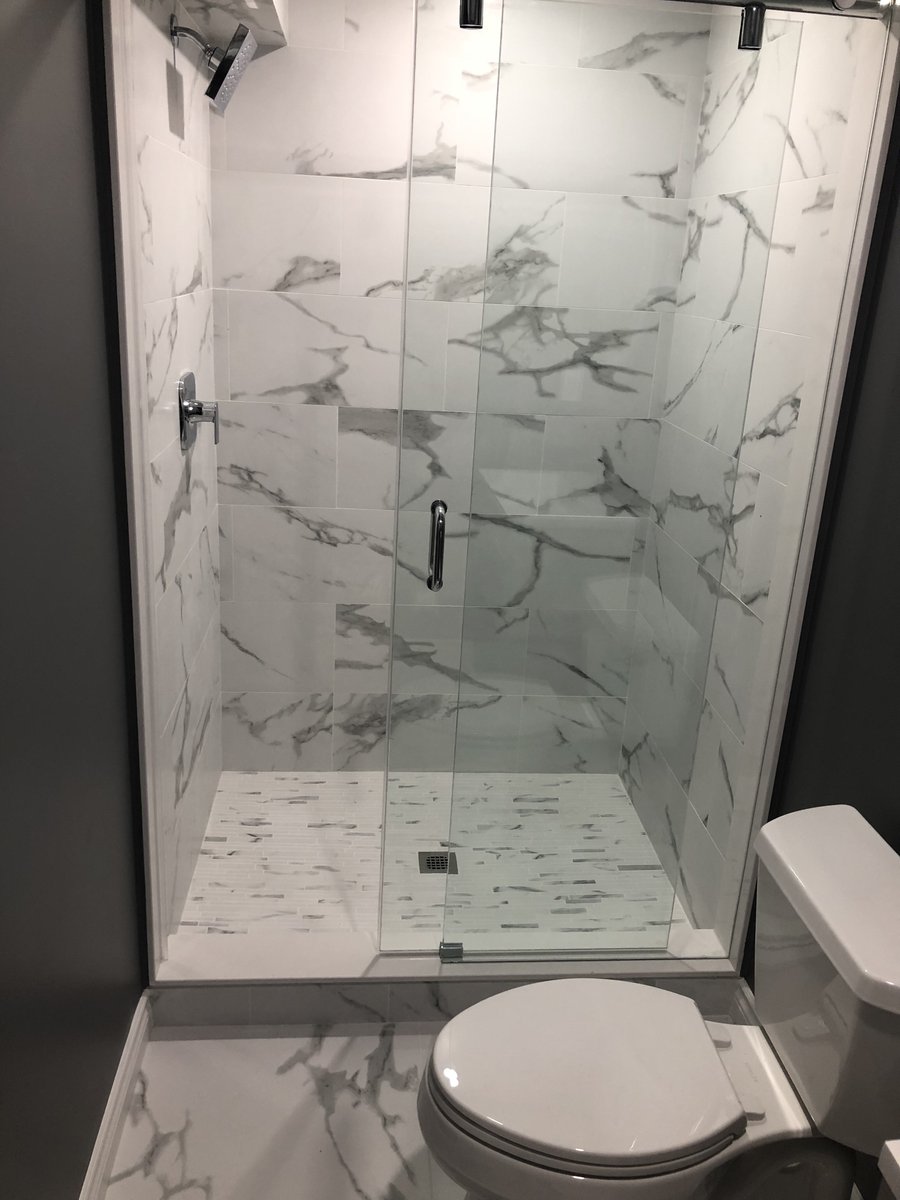 Heated Tile Installation for remodeled basement bathroom wide shot