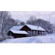 House cover by snow in winter landscape