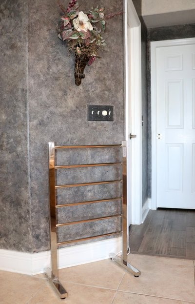 Ibiza Towel Warmer in Bathroom against wall