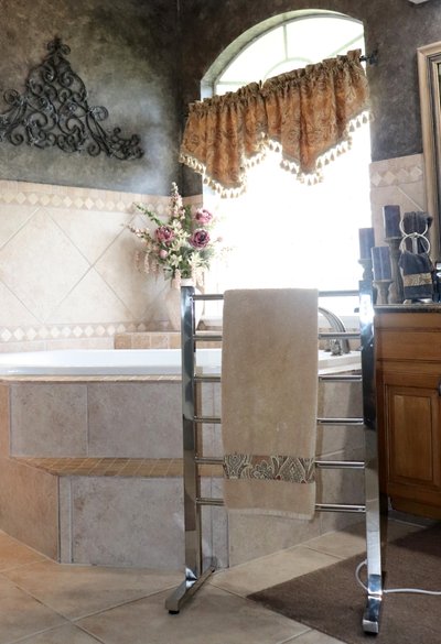 Ibiza Towel Warmer in master bathroom next to tub
