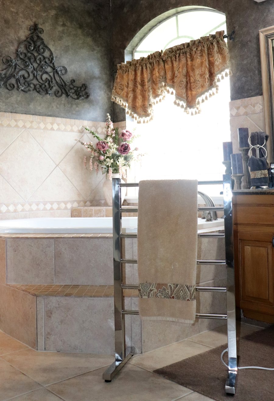 Ibiza Towel Warmer in master bathroom next to tub