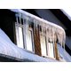 Ice dam on roof during winter