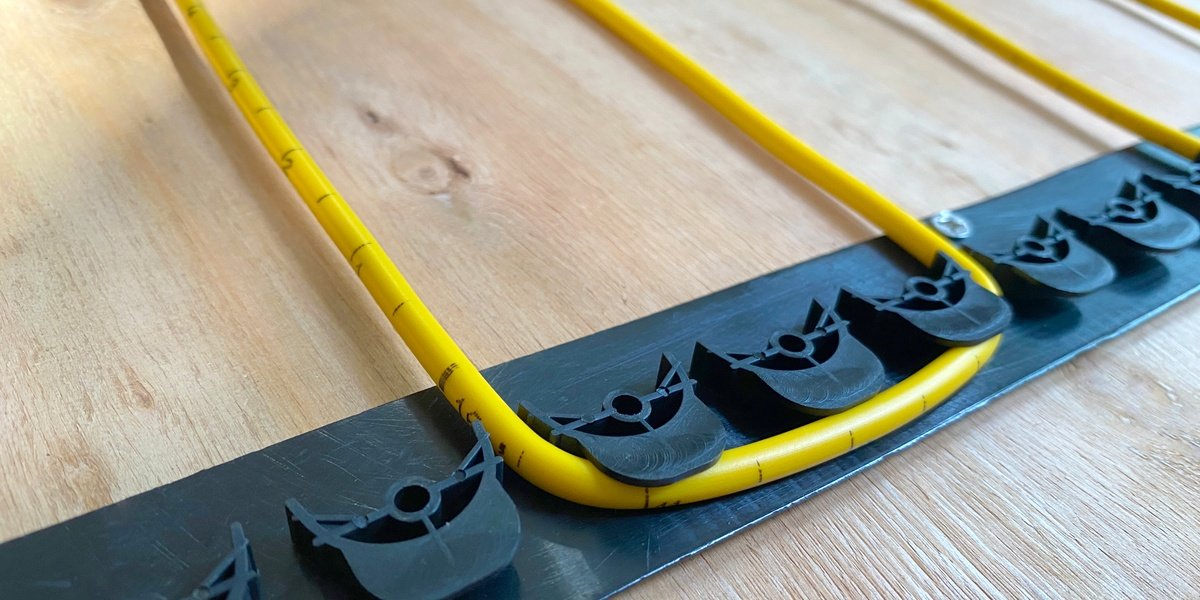 TempZone Ruler Cable with GripStrip on wood subfloor Installation