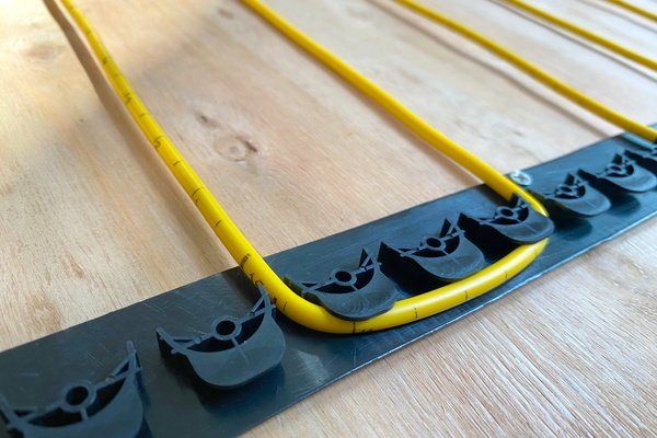 TempZone Ruler Cable with GripStrip on wood subfloor Installation