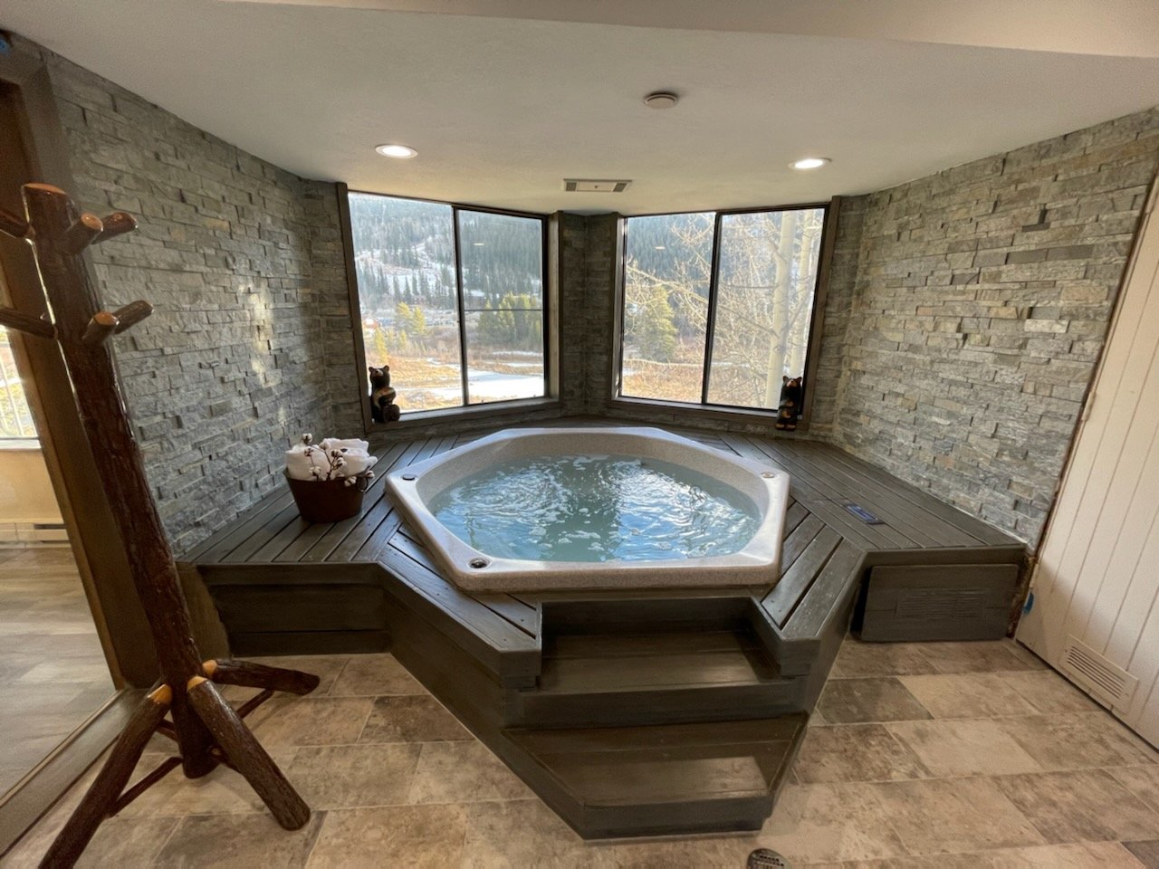 Radiant floor heating in a luxurious hot tub master bathroom in Keystone, Colorado, installed by Rest Assured, LLC.