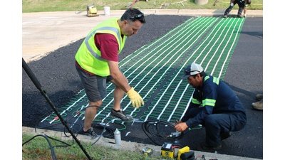 Jain Society Snow Melt Install Laying out snow melt mats (13)