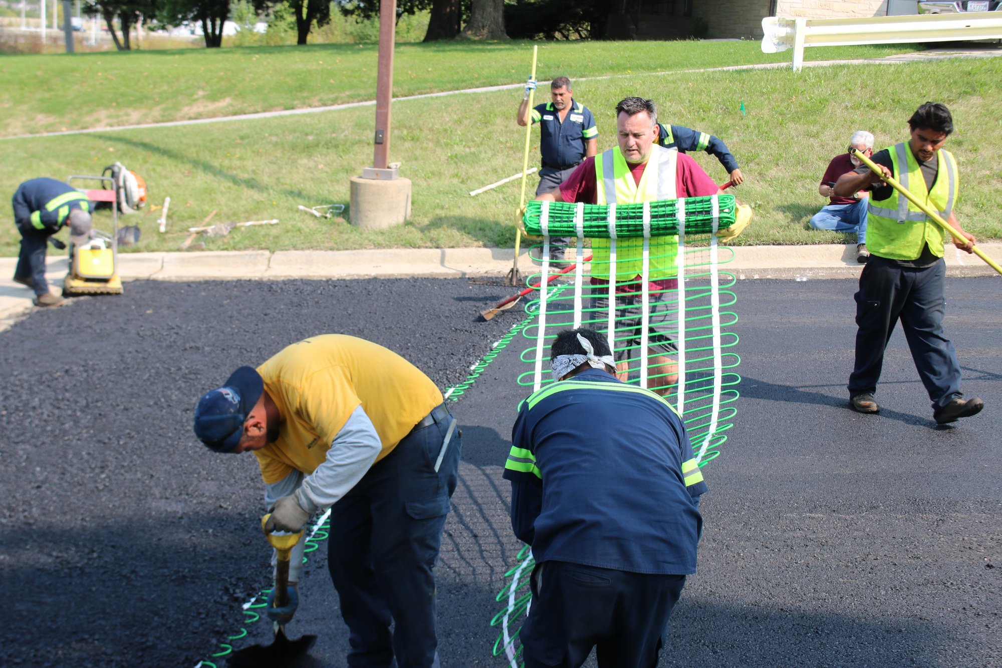 Jain Society Snow Melt Install Laying out snow melt mats (5)