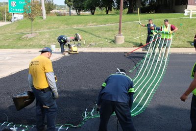 Jain Society Snow Melt Install Laying out snow melt mats (2)