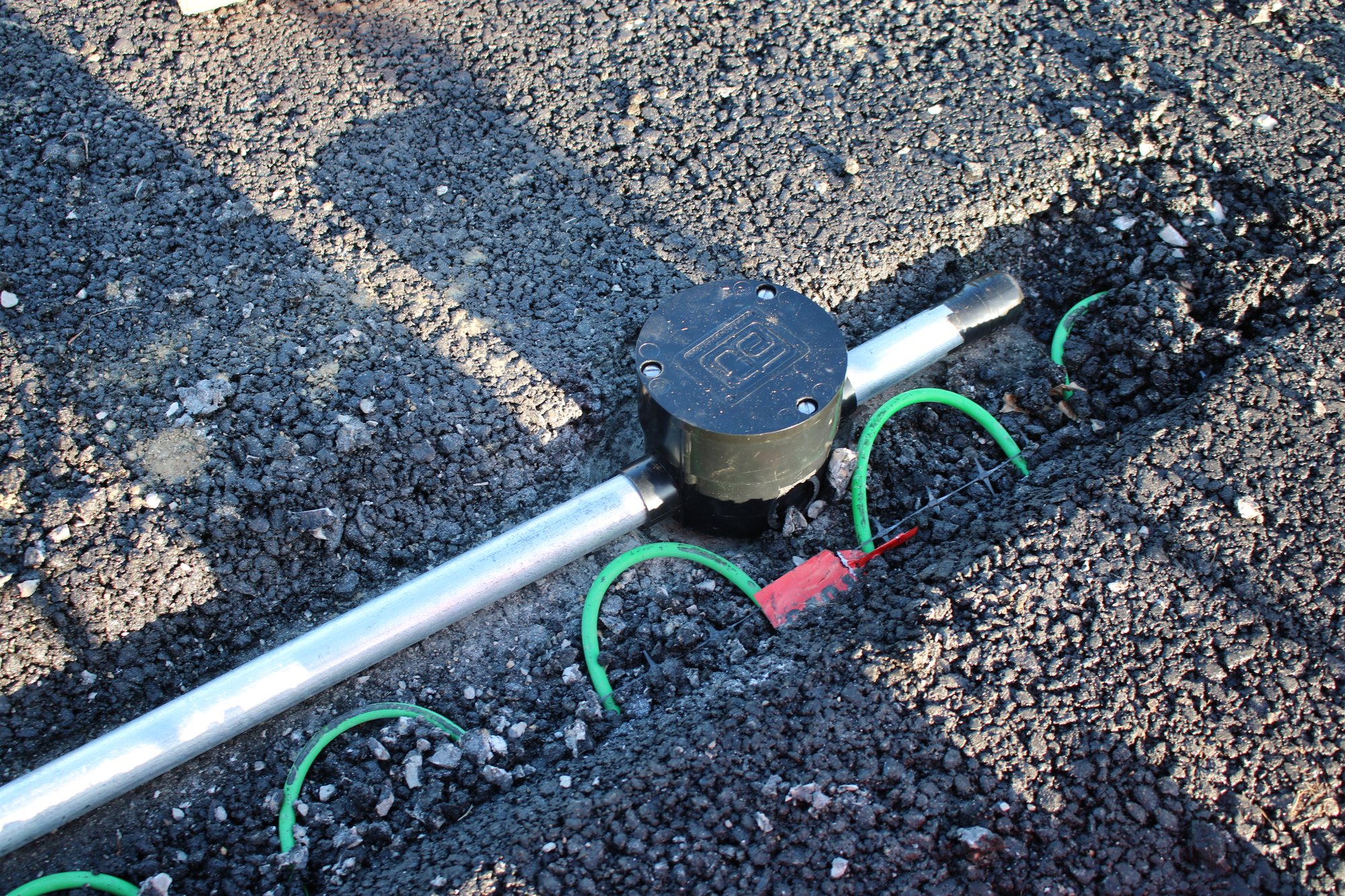 Wiring and installing conduit for snow melt smartinstall at jain society temple (30)