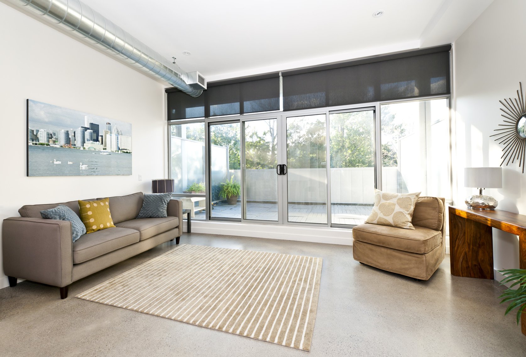 Concrete floors look industrial and stylish in living areas. 