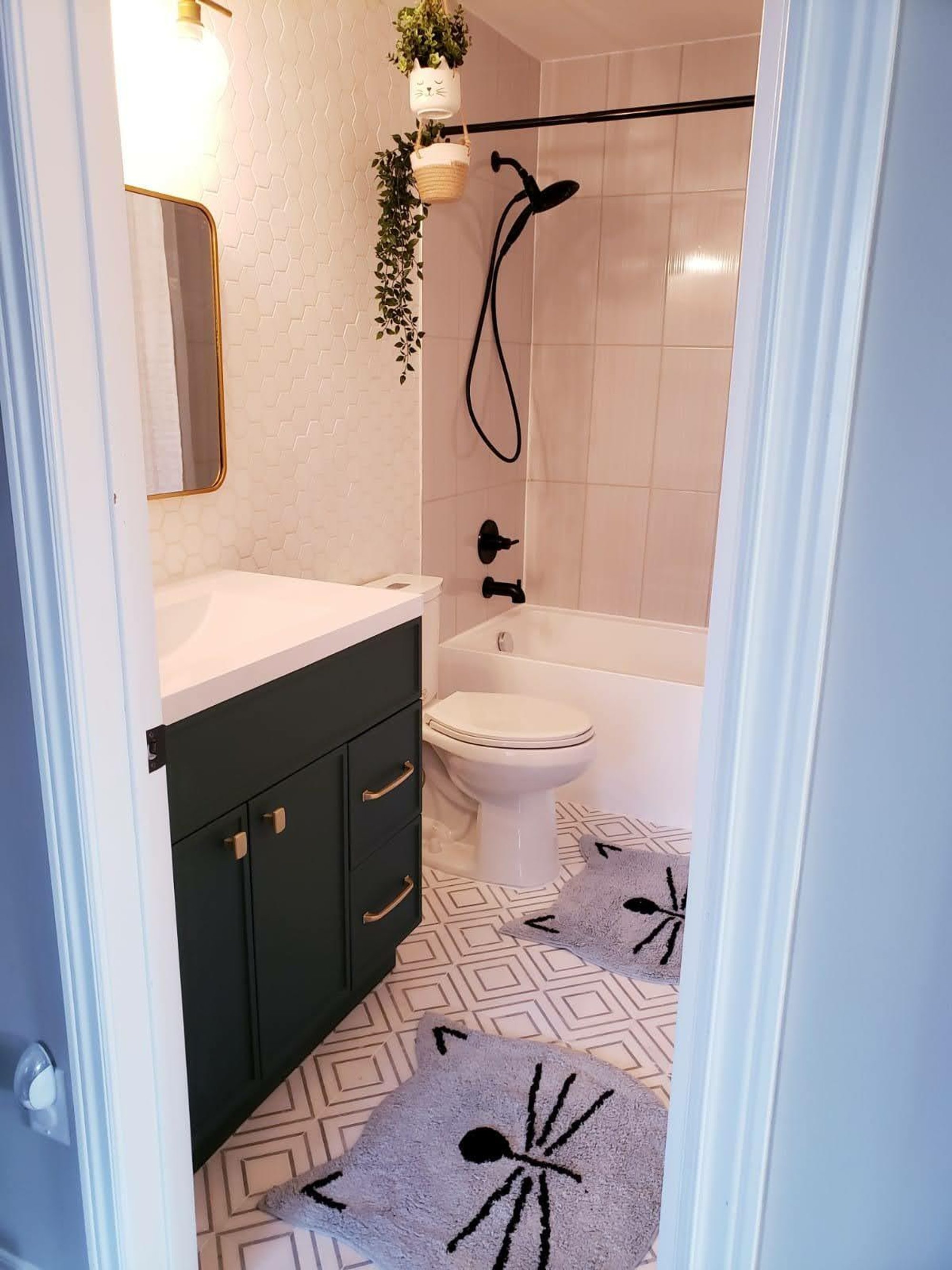 Instagram influencer bathroom project after shot with bath mats by hana sethi