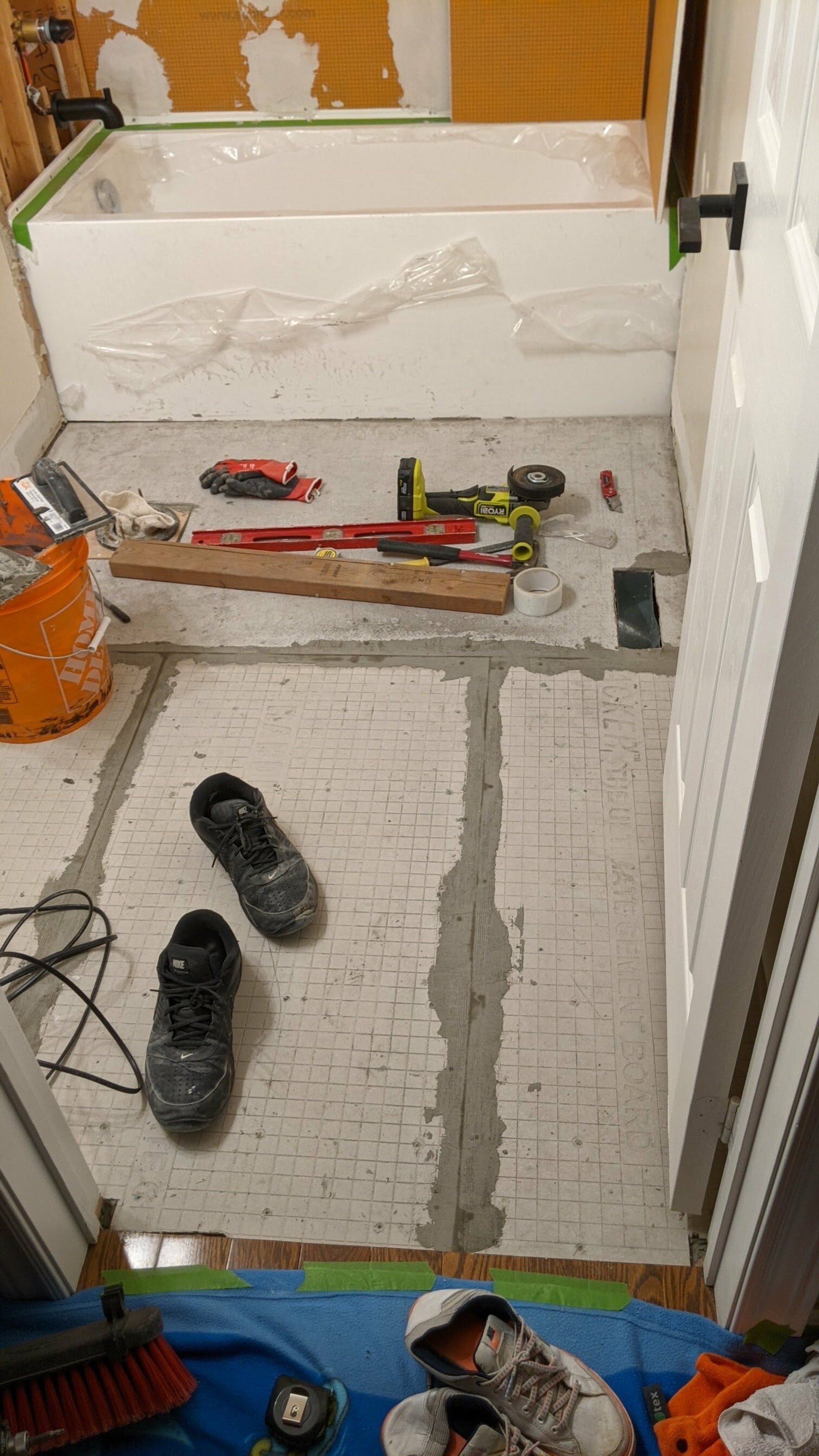Instagram influencer bathroom project during tile installation by hana sethi
