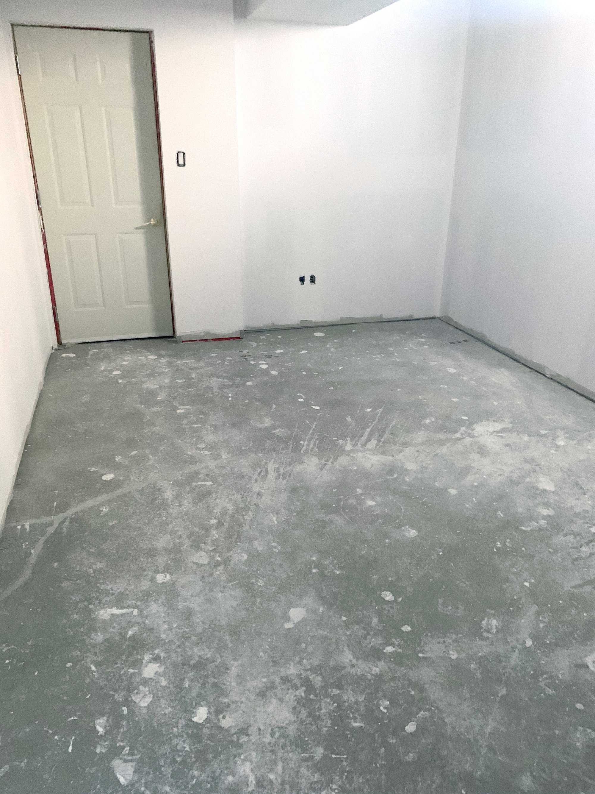 Installation of Luxury Vinyl Tile for Heated Basement Bedroom after drywall