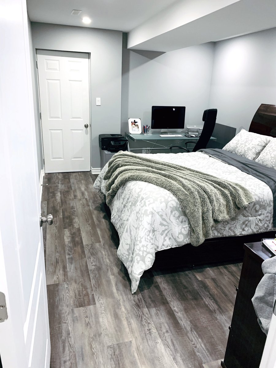 Installation of Luxury Vinyl Tile for Heated Basement Bedroom after shot long