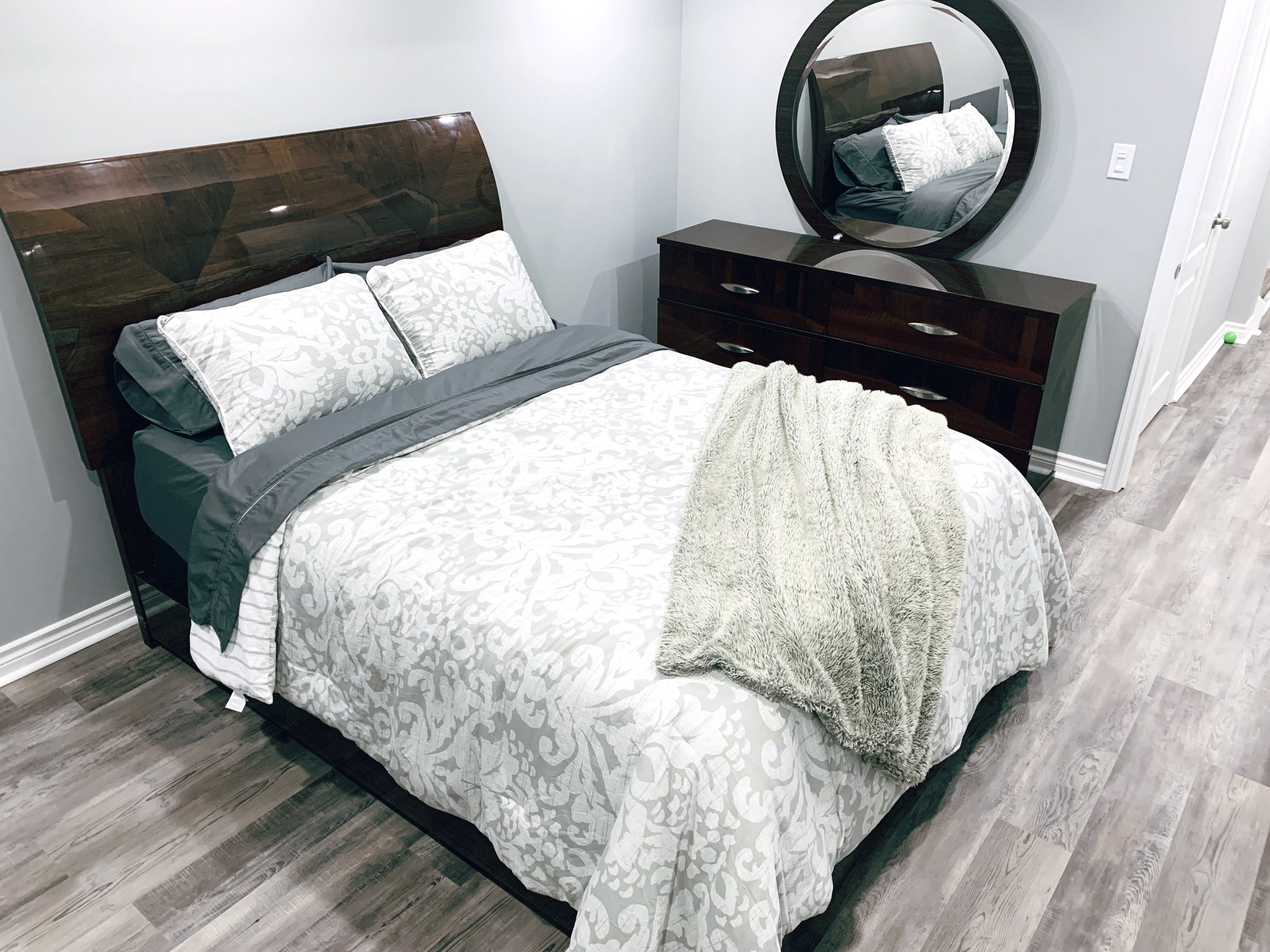 Installation of Luxury Vinyl Tile for Heated Basement Bedroom after shot