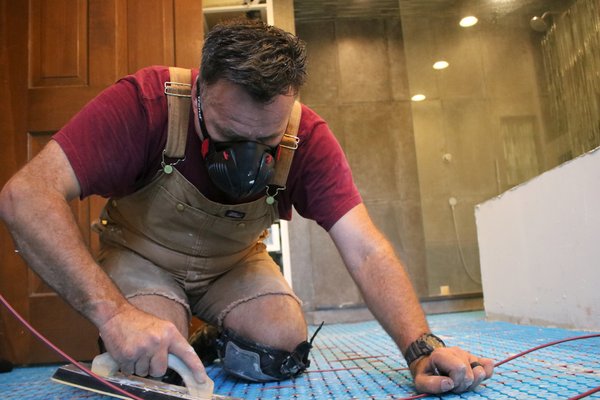 Installing Floor Heating cable with uncoupling membrane