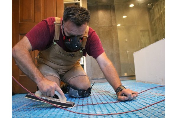 Installing Floor Heating cable with uncoupling membrane