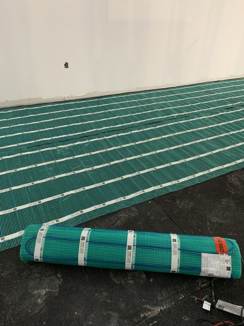 Installing Luxury Vinyl Tile for Heated Basement Playroom tempzone flex roll displayed