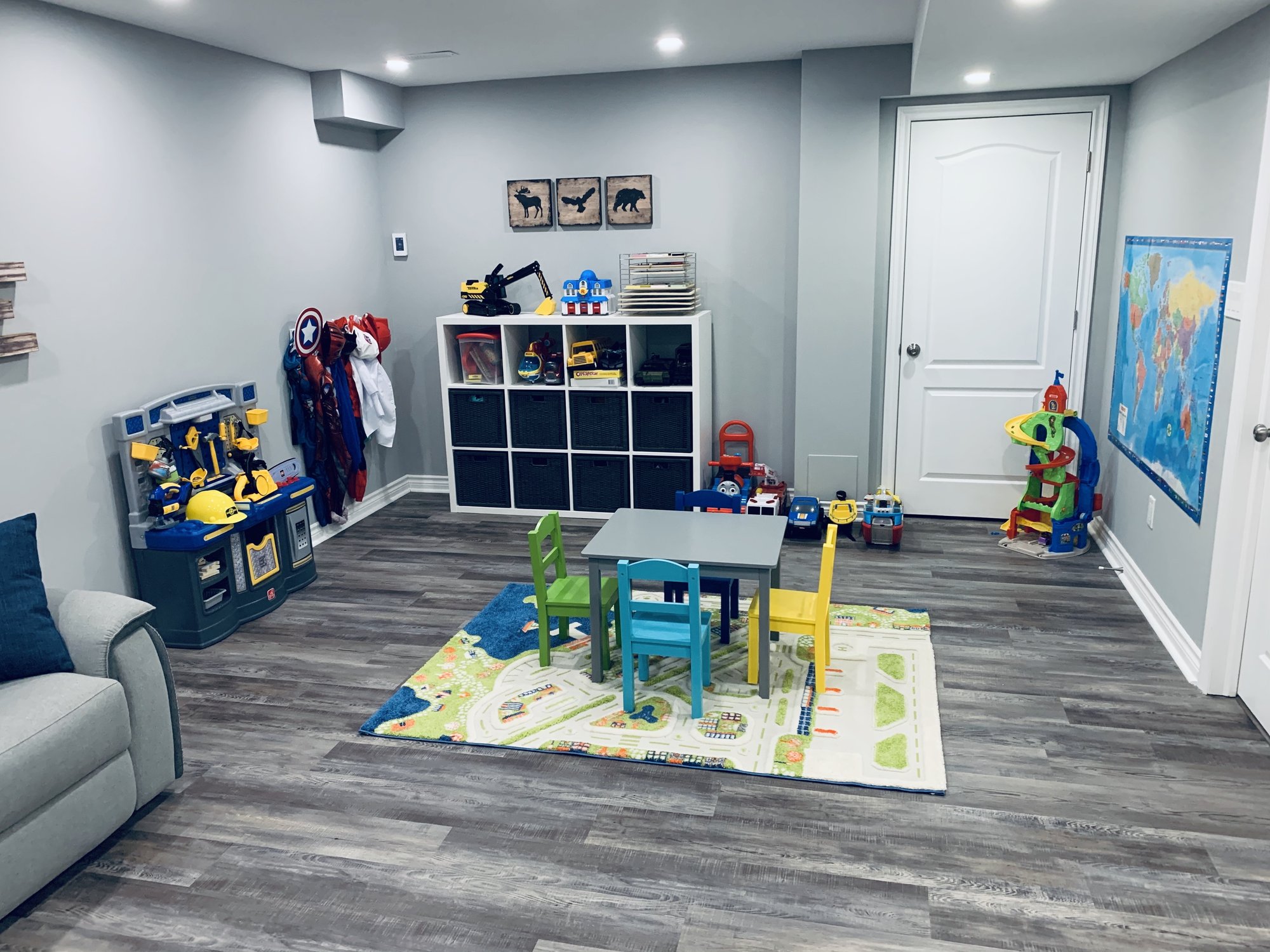 Installing Luxury Vinyl Tile for Heated Basement Playroom after shot wide angle