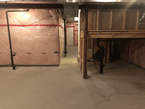 Installing Luxury Vinyl Tile for Heated Basement Playroom before shot