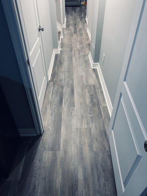 Installing Luxury Vinyl Tile for Heated Basement Playroom hallway