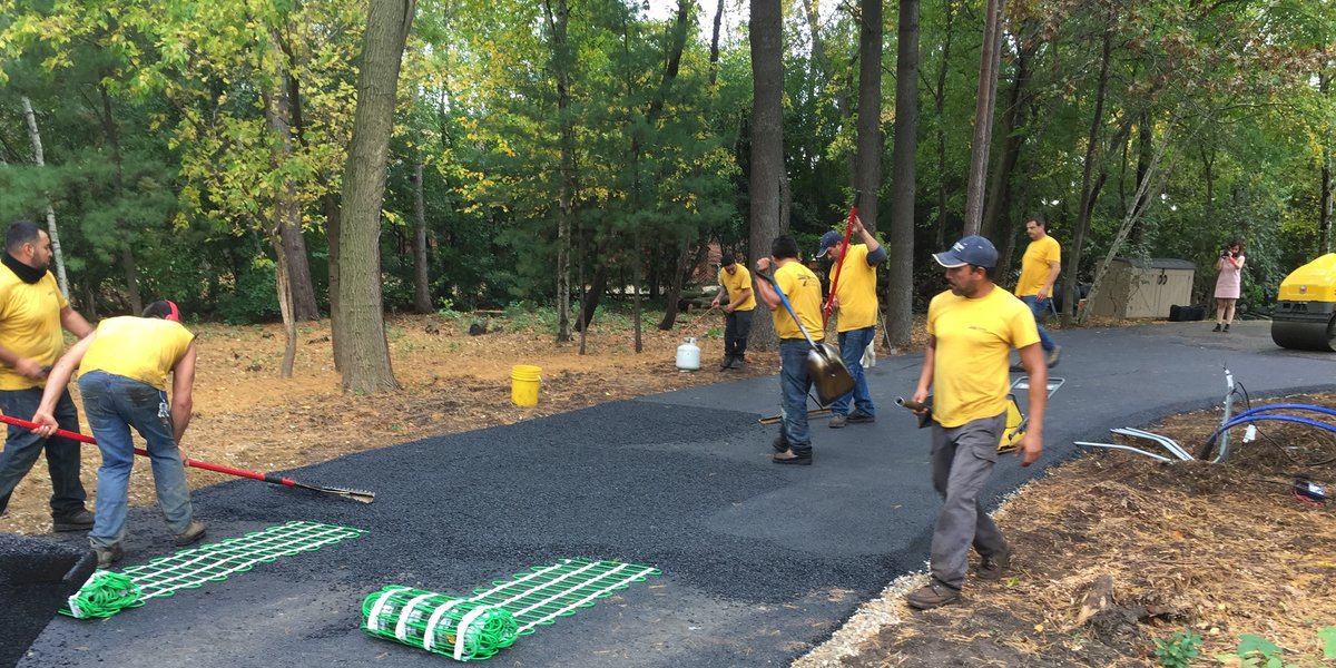Installing snow melt mats on asphalt driveway